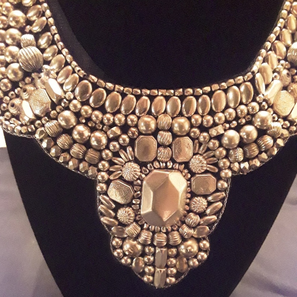Necklace with silver tone stones